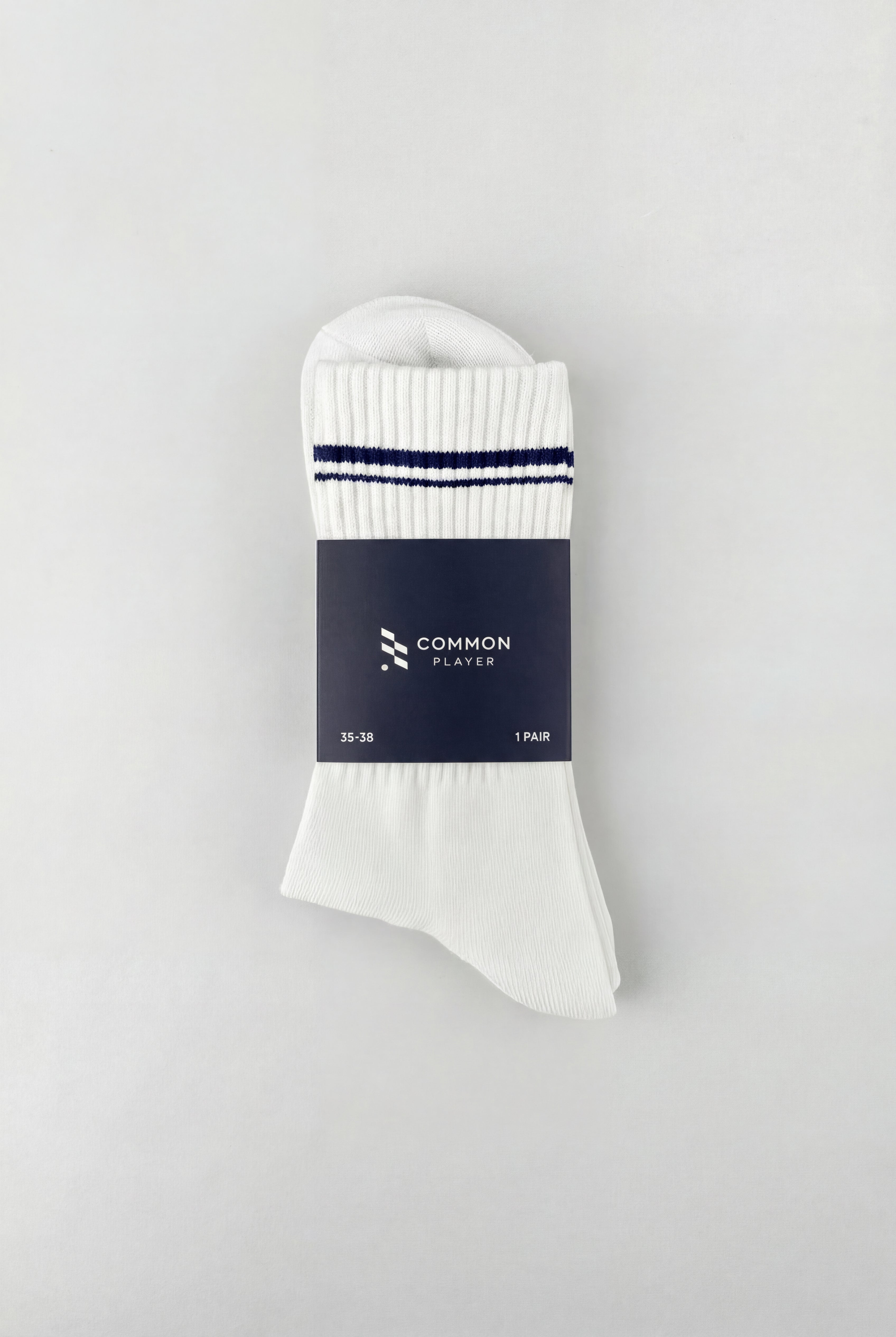 Performance socks with soft cushioning and breathable support for golf, tennis, and padel.