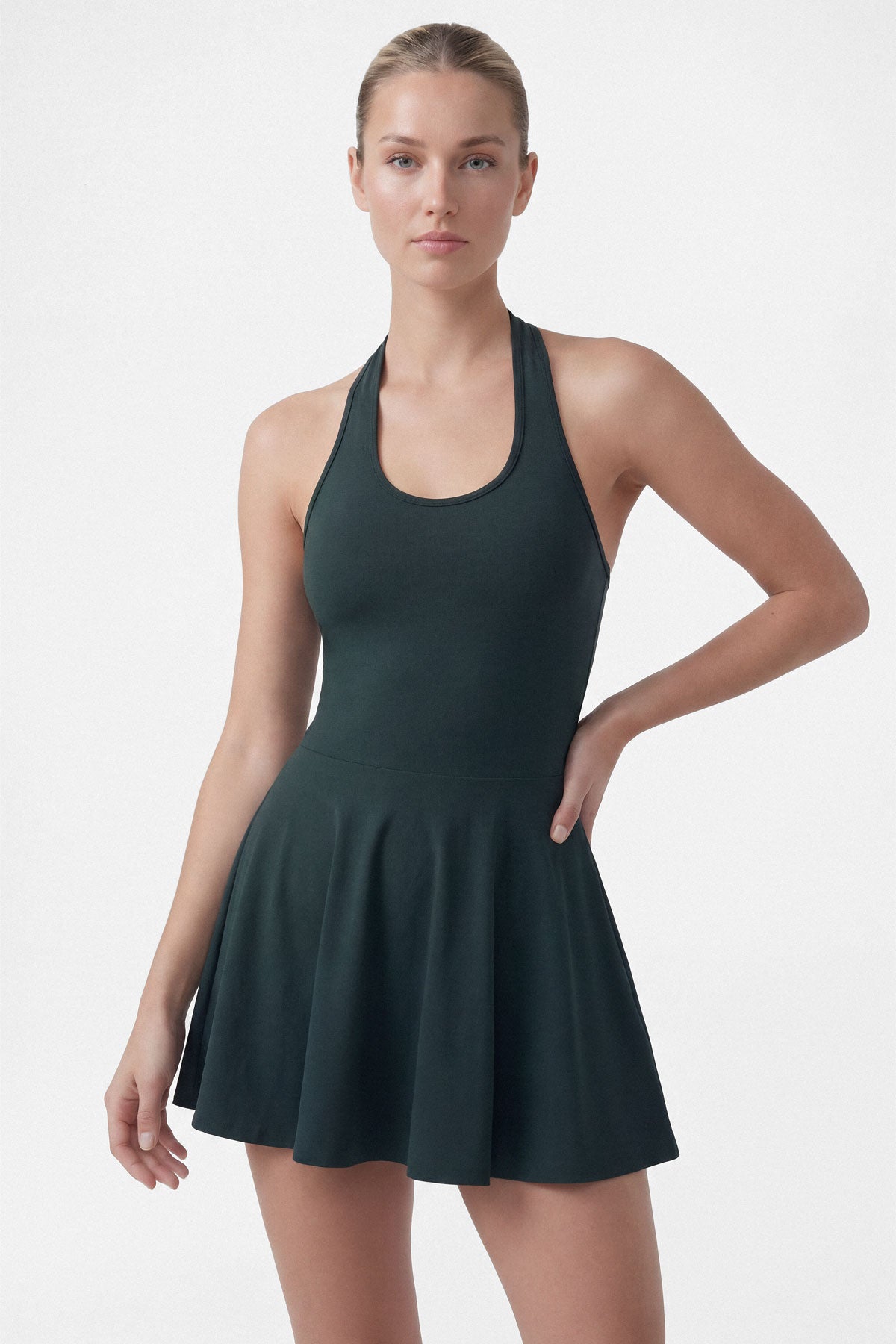Dark green golf dress with built-in shorts and halter neck