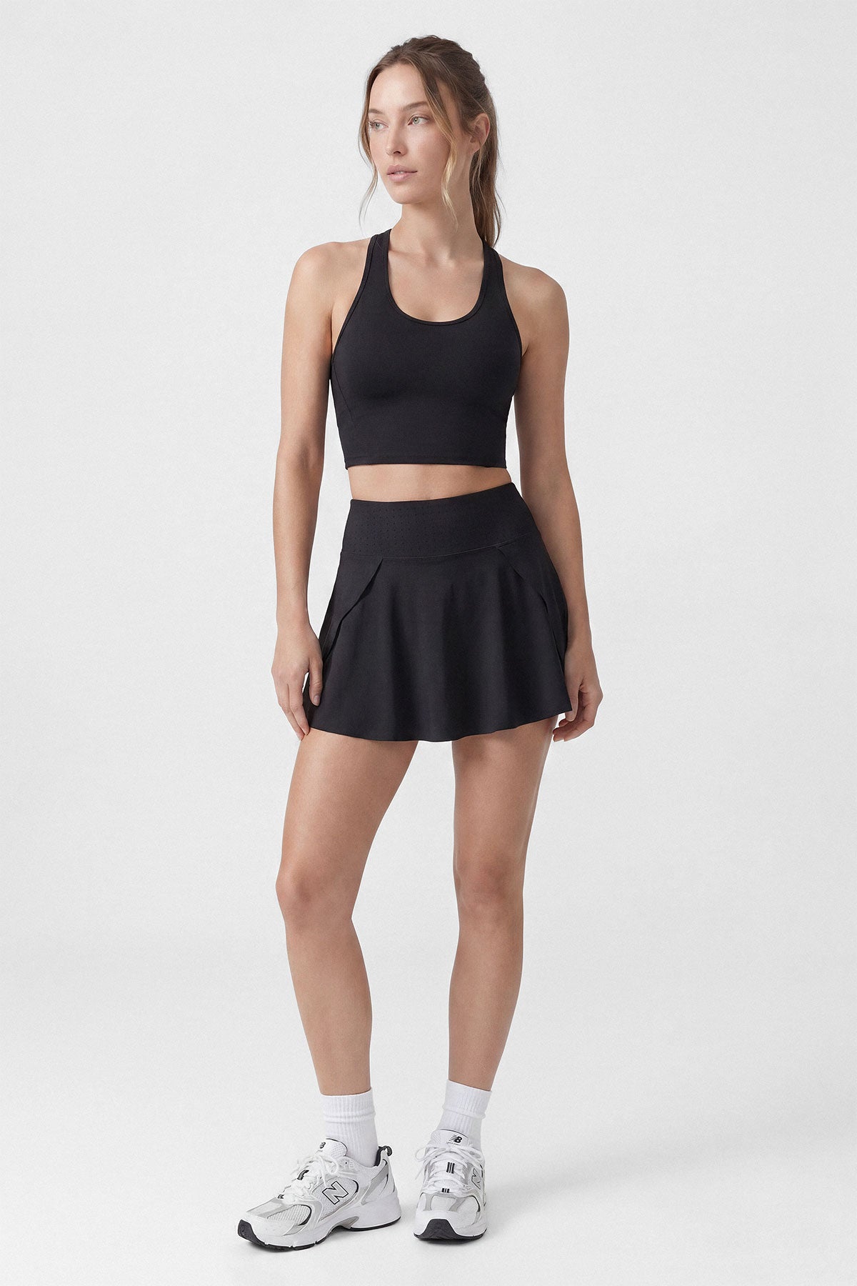 A black tennis sports bra with removable bra cups