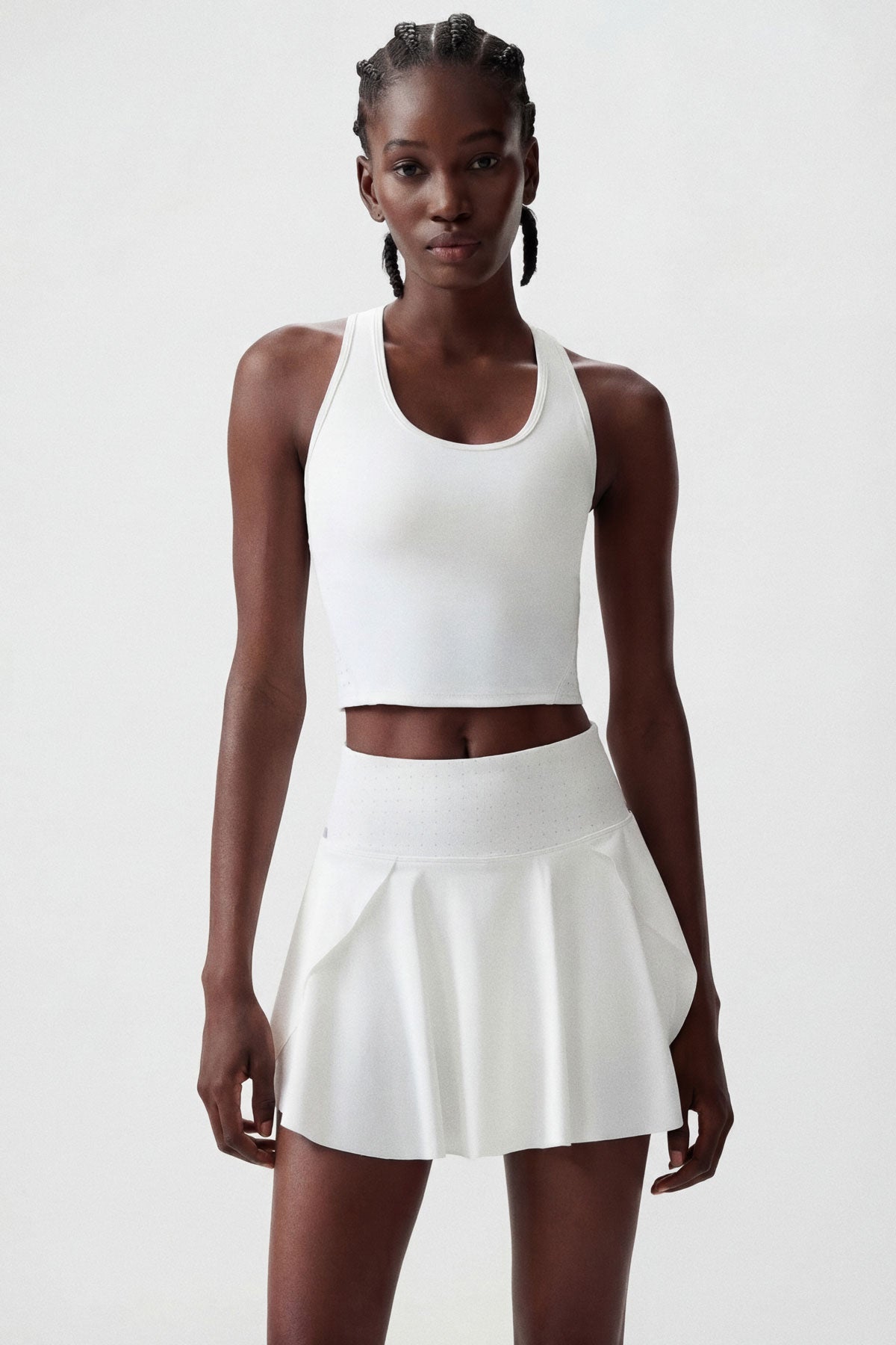 A white tennis sports bra with removable bra cups