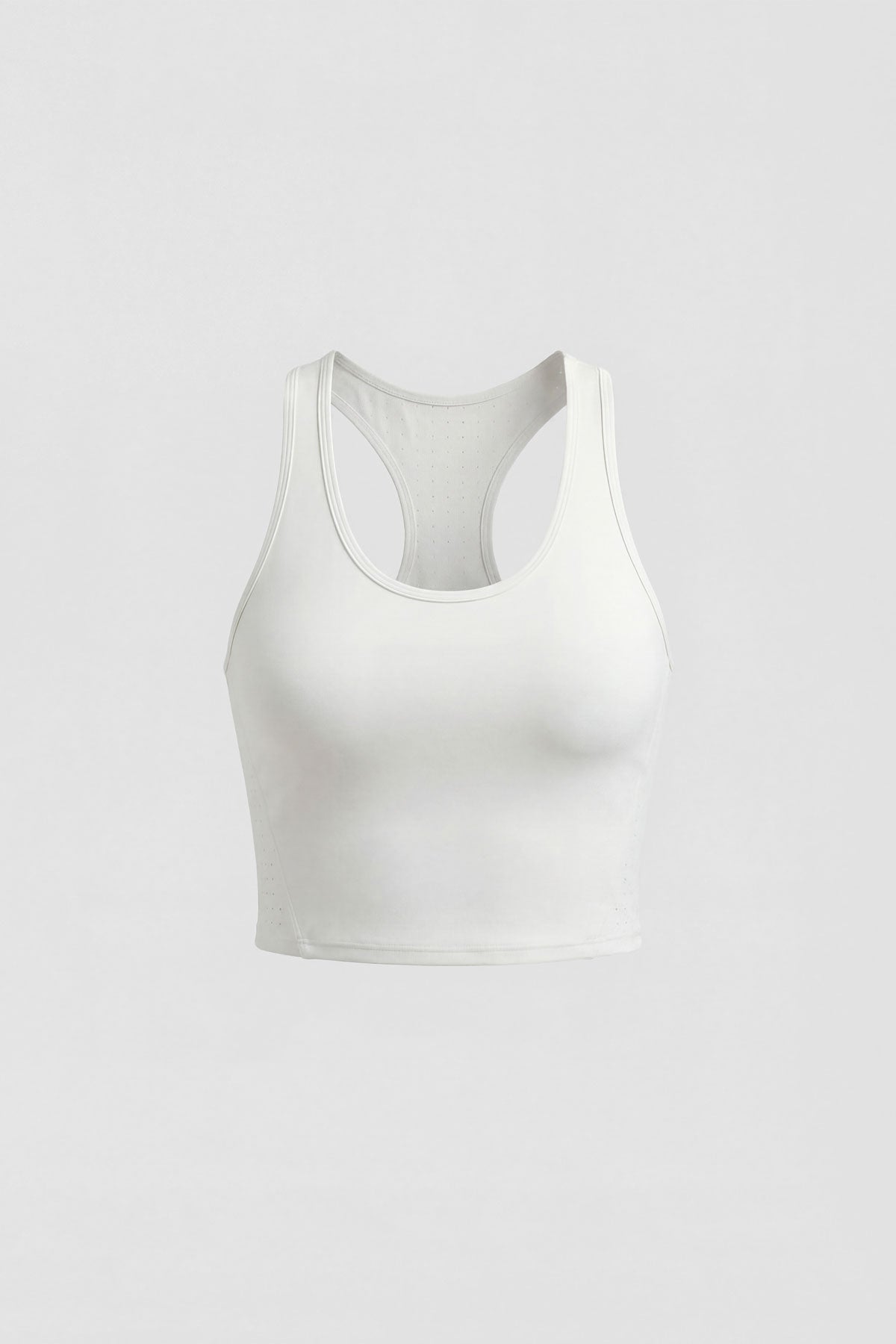 A white tennis sports bra with removable bra cups