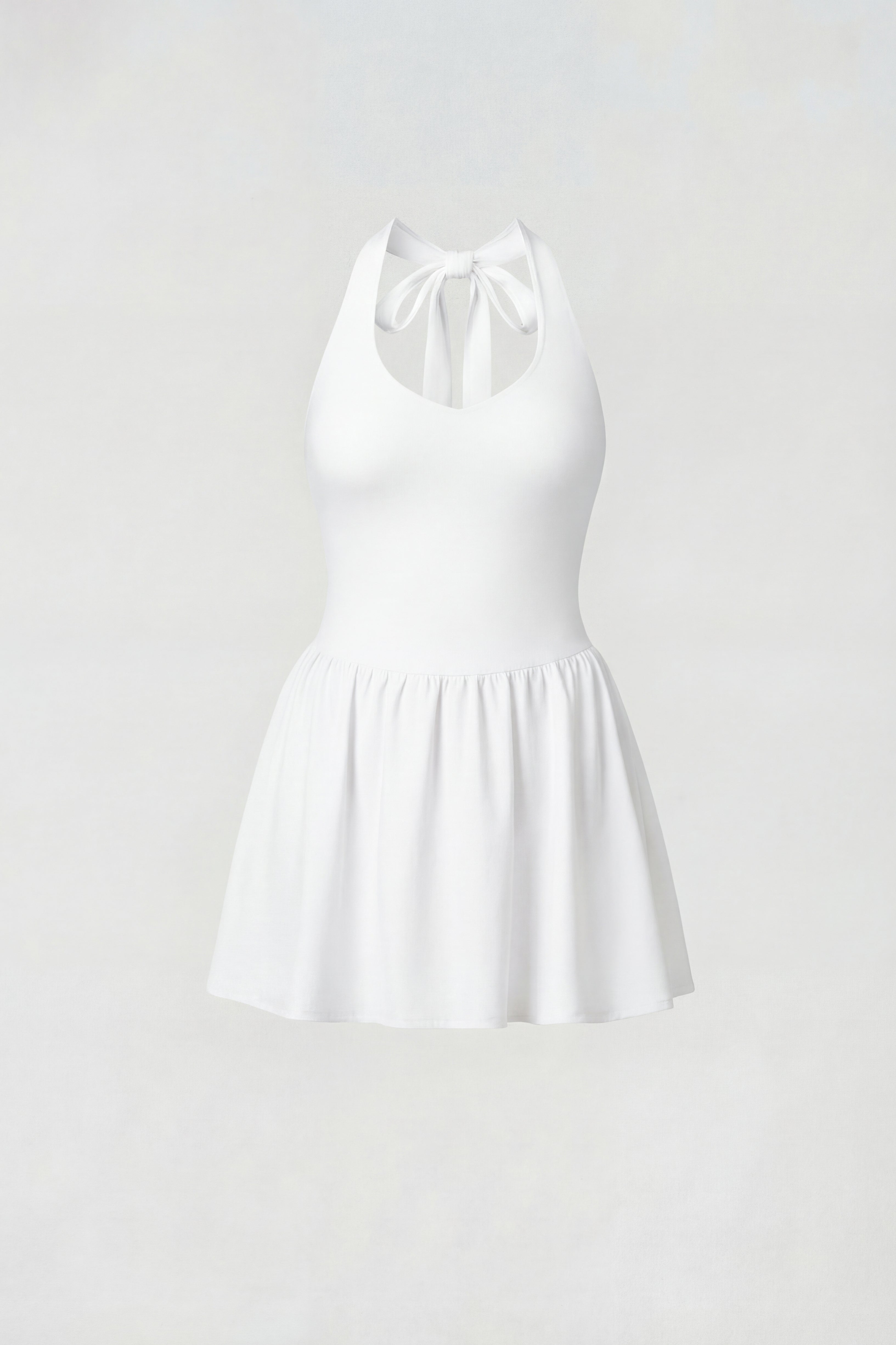 White tennis dress with halter neckline and flared skirt