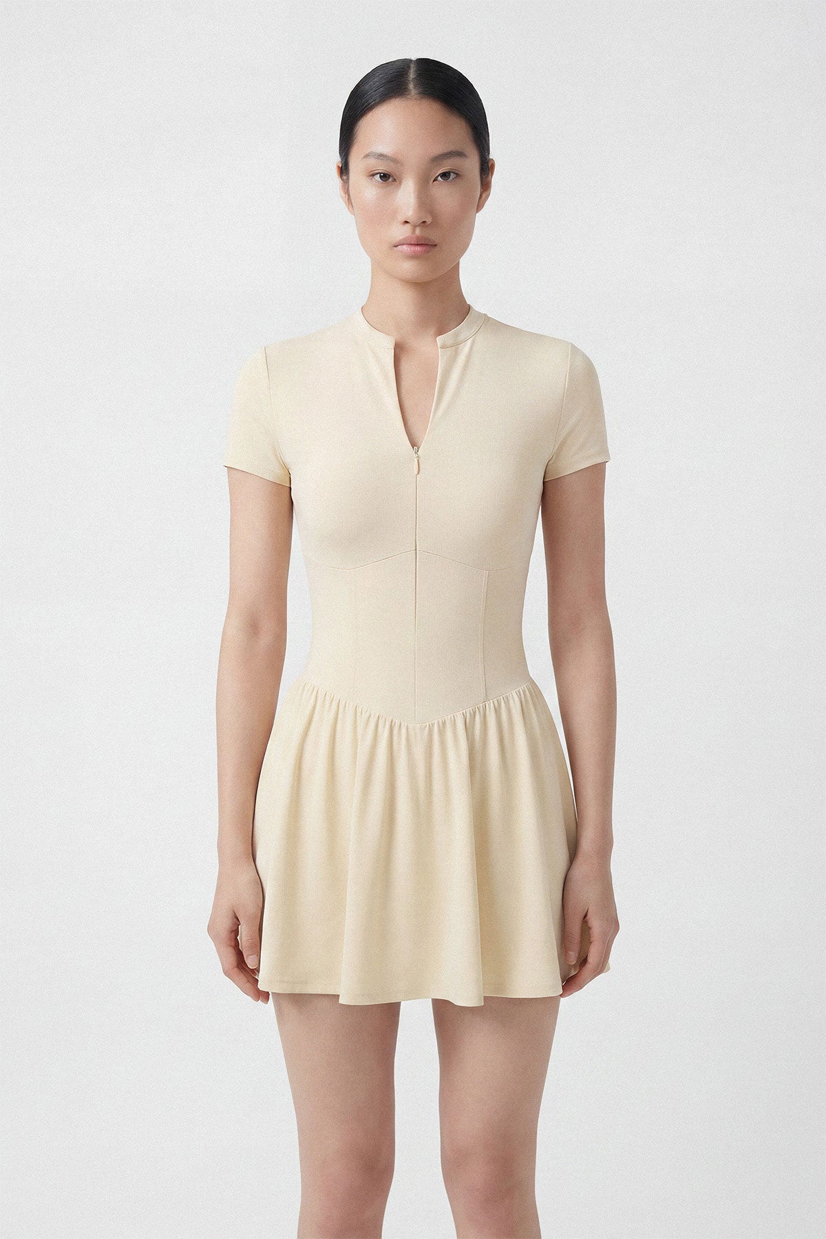 Butter yellow golf dress with short sleeves, built-in shorts and pocket