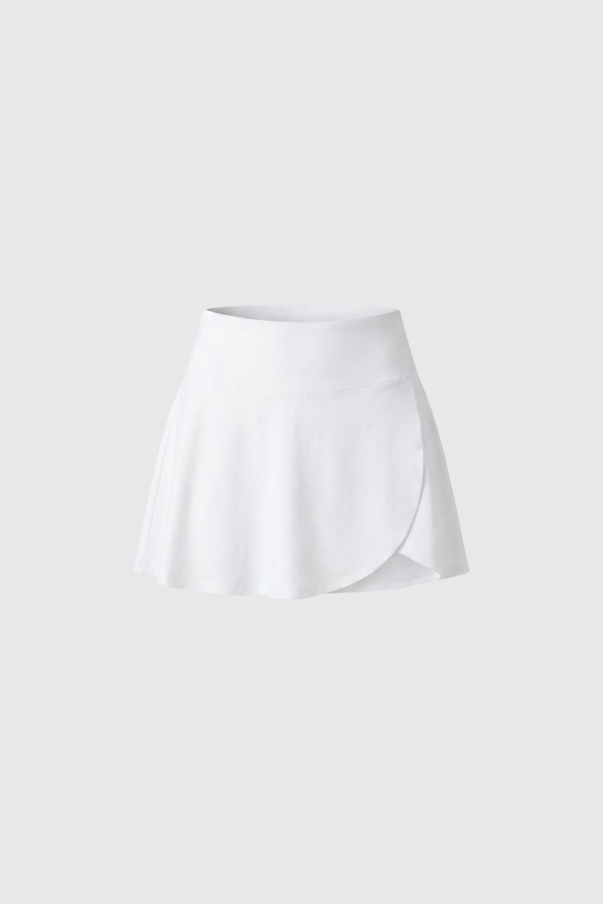 White flared tennis skirt with built-in shorts and a ball pocket